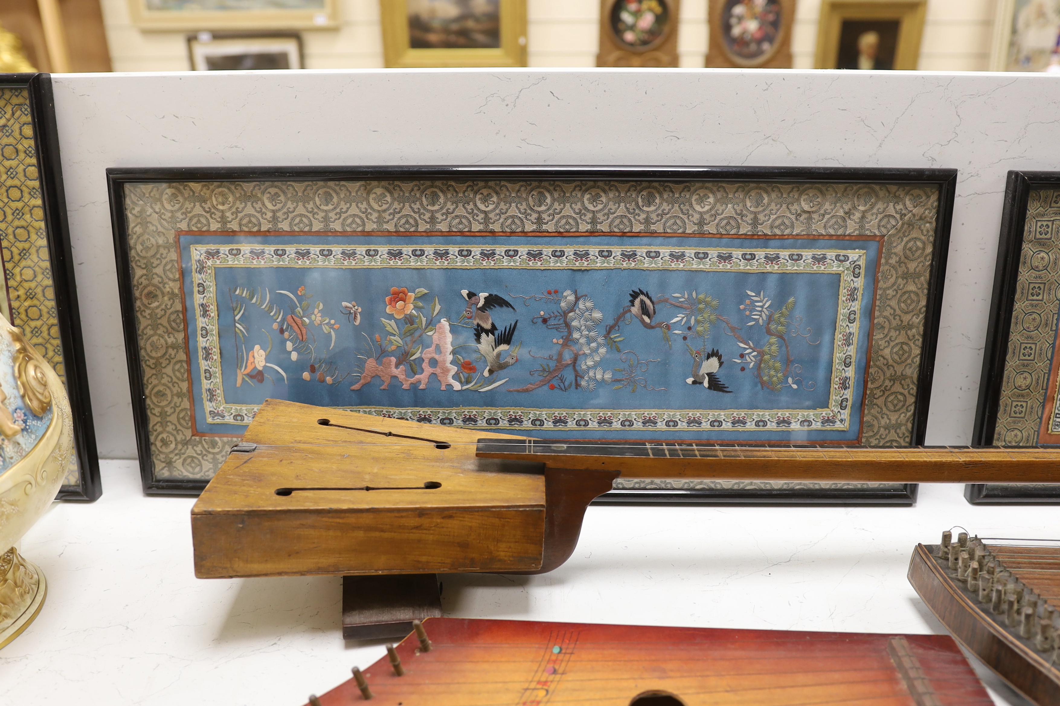 Two Chinese mid 20th century silk embroidered figurative panels with two similar Chinese floral and bird framed embroideries, all four Dordrecht with silk brocade, two figurative embroideries, 63cm wide x 32cm high